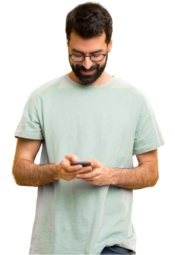 Smiling man looking at his mobile phone